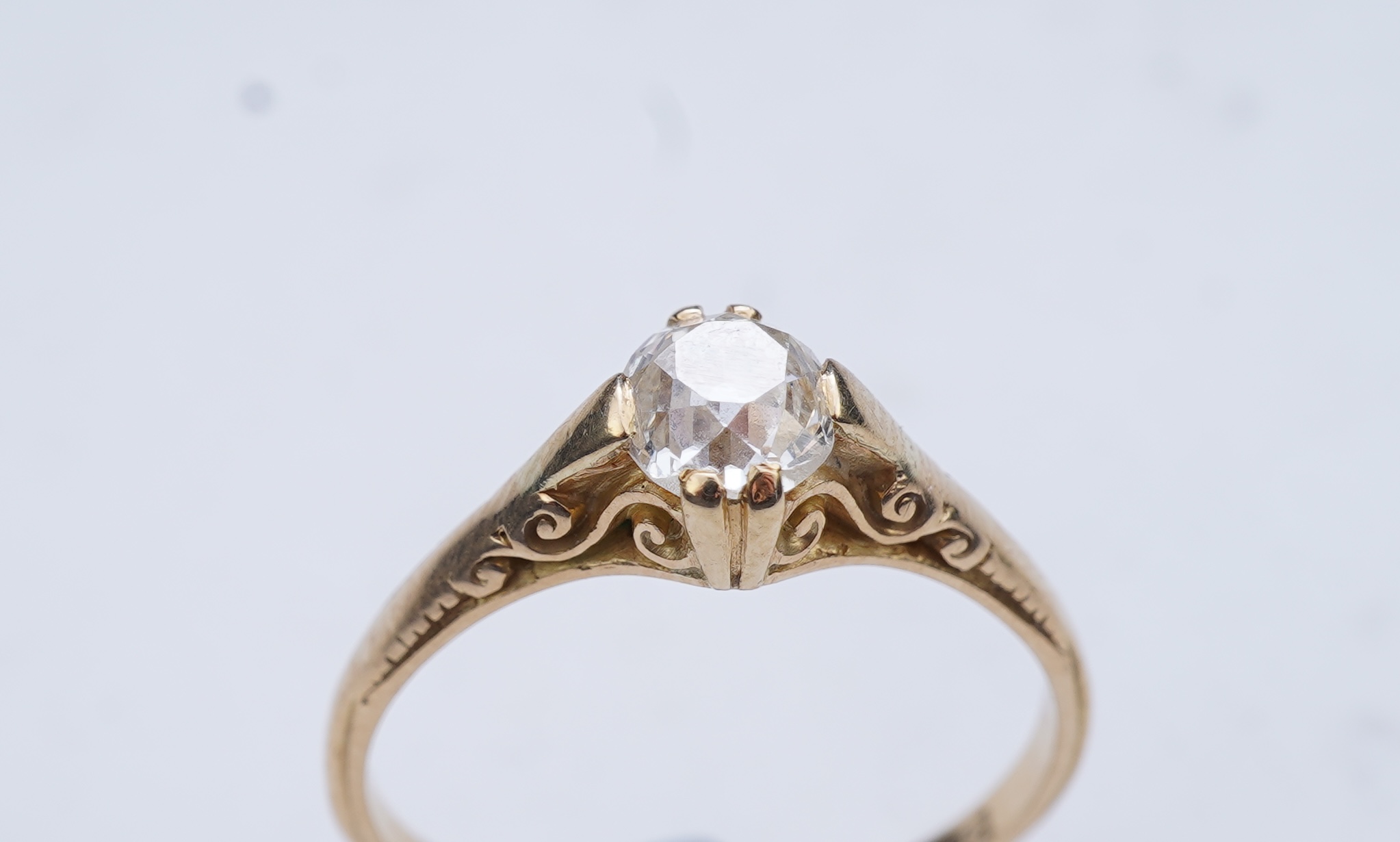 A gold and diamond ring, early 20th century
